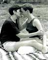 Lesbian Kissing on Picnic Blanket